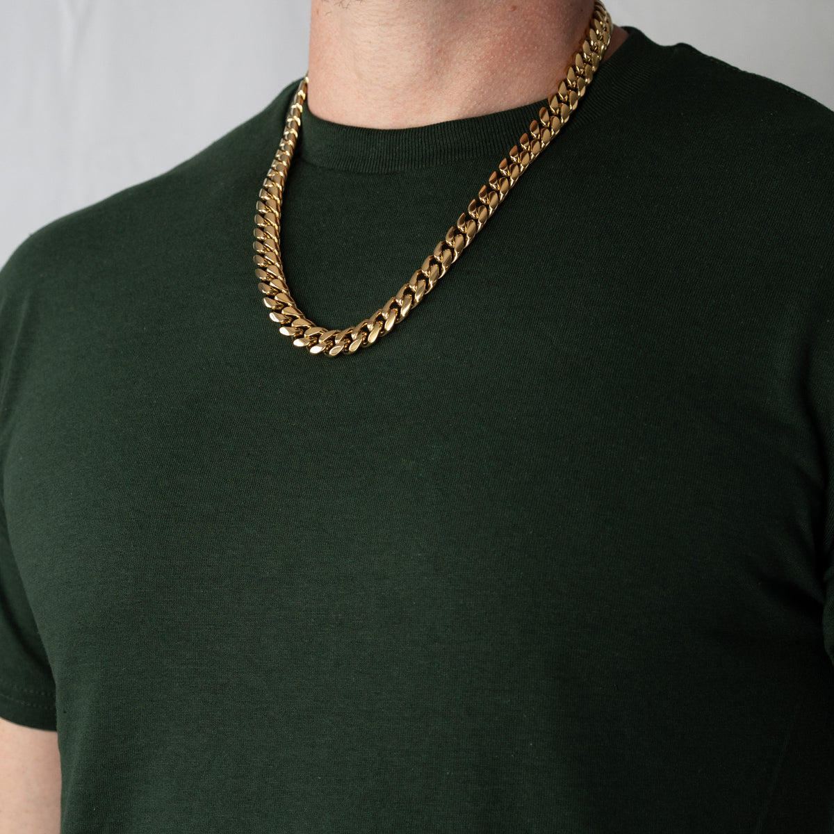 Cadena Cubana Miami 12mm Prosperidad Baño de Oro 14K · 22" · lado