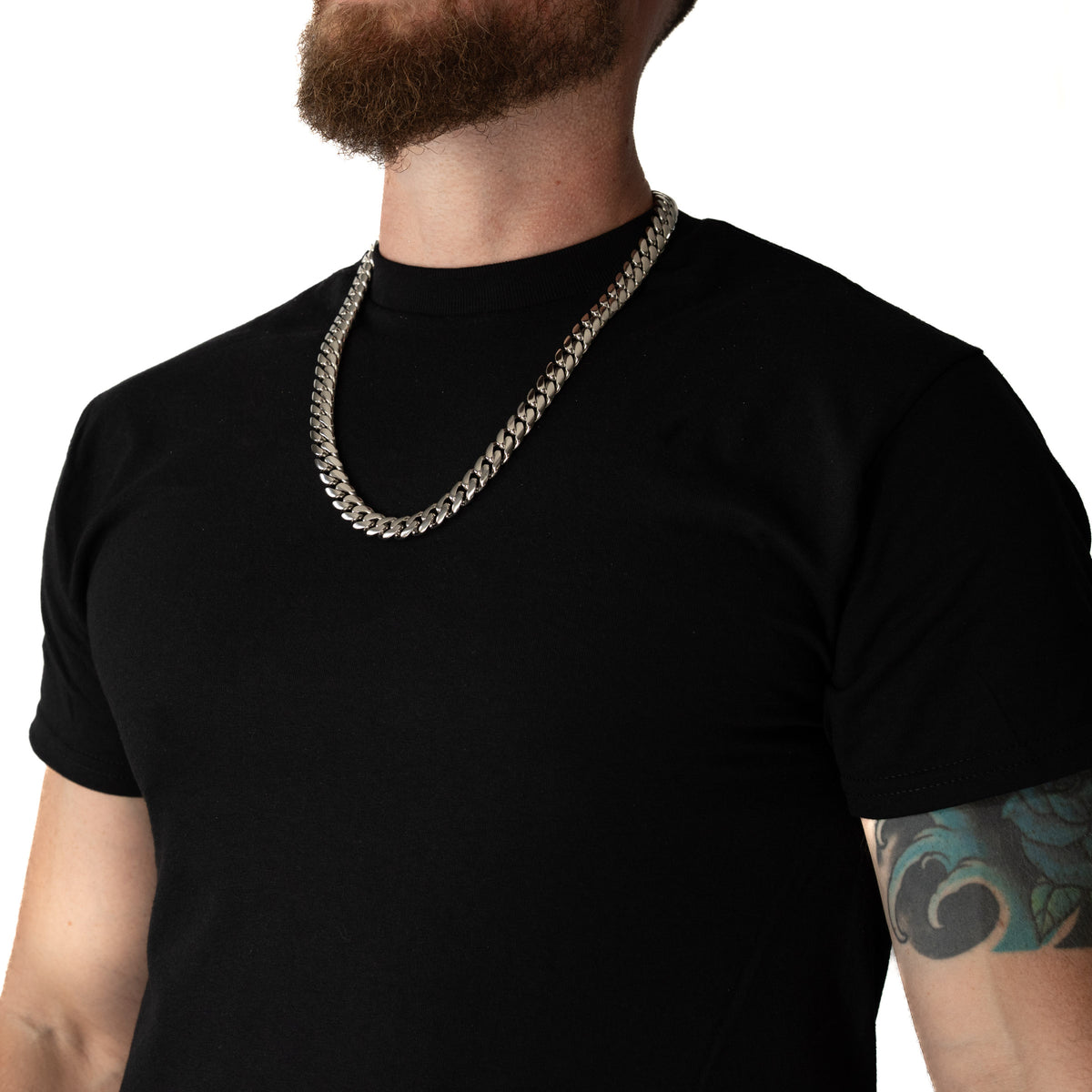 Cadena Cubana Miami 12mm Prosperidad Baño de Oro Blanco 14K · 24" · lado