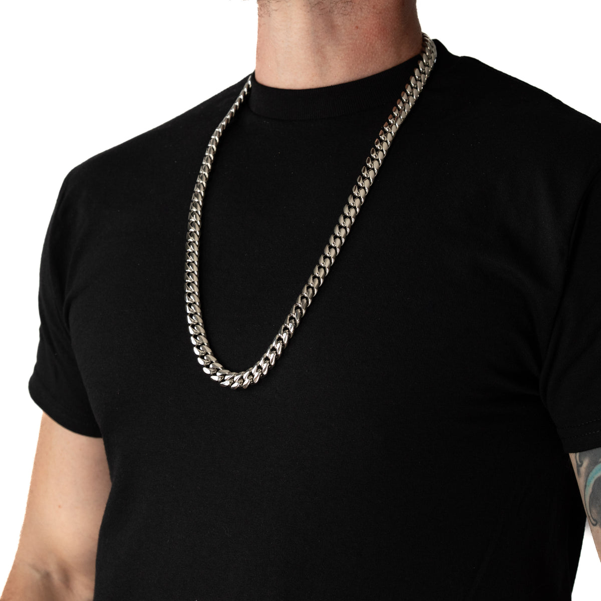 Cadena Cubana Miami 12mm Prosperidad Baño de Oro Blanco 14K · 30" · lado
