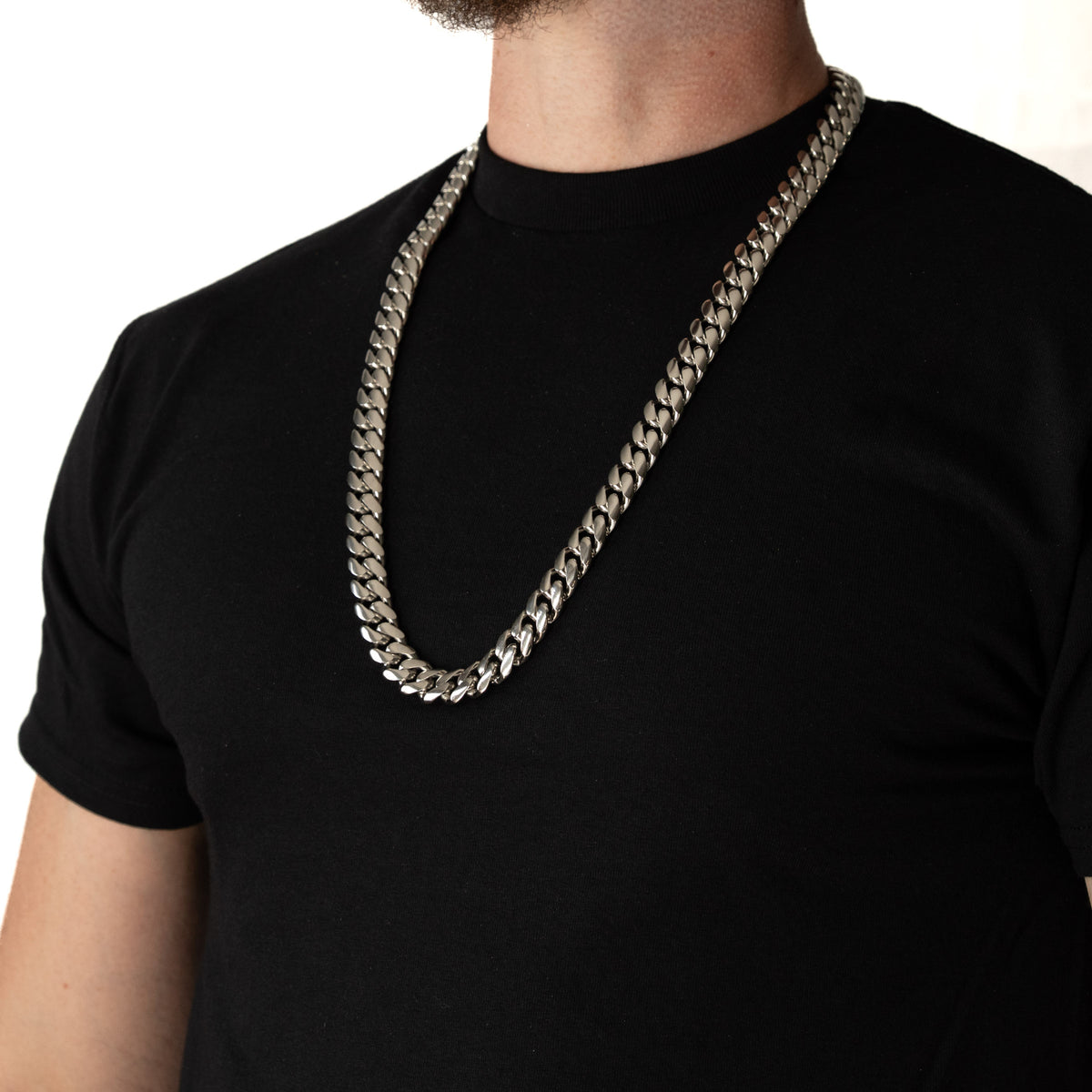 Cadena Cubana Miami 14mm Prosperidad Baño de Oro Blanco 14K · 30" · lado