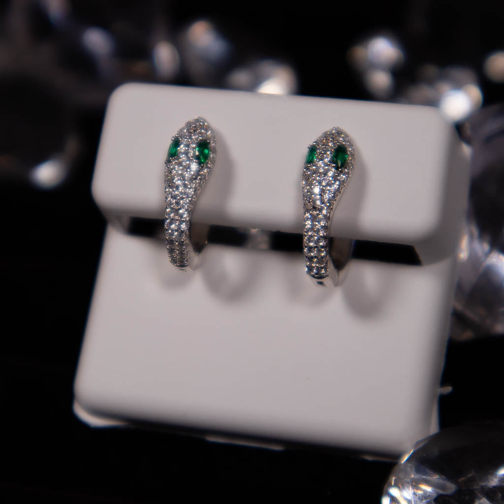 Snake & Green Eyes Earrings White Gold
